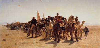 Rombongan bepergian dengan mengendari unta.